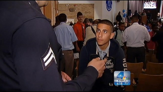 Some 100 LA businessmen converged on Jordan High School on Wednesday for a symposium dubbed 