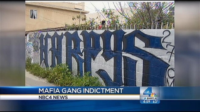 Eighteen people were arrested early Thursday as part of a two-year probe into South LA street gangs allegedly controlled by an imprisoned Mexican Mafia member who delivered orders -- some of which directed gang members to target USC students -- through his daughter and son-in-law. Gordon Tokumatsu reports for the NBC4 News at 5 p.m. on Dec. 6, 2012.