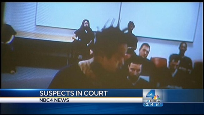 Two suspects in the Northridge quadruple murder case were scheduled to appear in court Wednesday for unrelated cases. Toni Guinyard reports for the NBC4 News at Noon on Dec. 19, 2012.