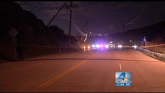 A celebrity photographer attempting to take pictures of Justin Bieber's white Ferrari parked on Sepulveda Boulevard was struck by an oncoming car, and killed Tuesday night. Flowers now adorn the spot where the photographer died. Jane Yamamoto reports for the NBC4 News at 11 p.m. on January 2, 2013.