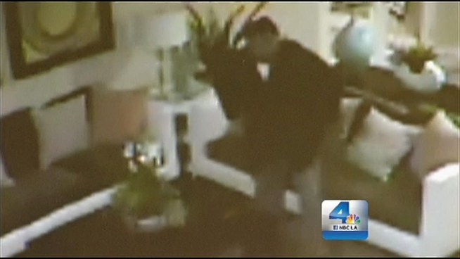 Surveillance video a man igniting a blaze in an Irvine apartment building s leasing office, apparently with the plan to ransack the units after residents were ordered to leave the burning building, according to the Irvine Police Department. Janet Kwak reports from Irvine for the NBC4 News at 11 p.m. on Jan. 10, 2013.
