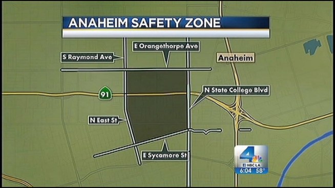 Notices served to dozens of known gang members in Anaheim Wednesday warn them that if two or more even stand together, they could be arrested. The injunction implements a 1 square-mile 