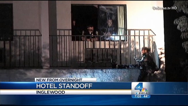 A man allegedly started a fire in an Inglewood hotel room Friday night before jumping from balcony to balcony after police arrived. Video broadcast Saturday Jan. 19, 2013 on Today in LA.