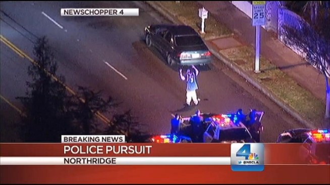 A wanted driver apparently forgot to put his car in park because as he was surrendering to police in North Hills, the sedan he was driving continued to roll for several yards before coming to a stop on the curb. Colleen Williams reports for the NBC4 News at 11 p.m. on Jan. 24, 2013.