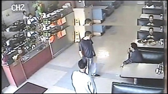 Police say the two men seen in this video are suspected of killing 26-year-old Paul Anthony Garcia, and are asking for the public's help to identify the pair. Raw video released on March 15, 2013.