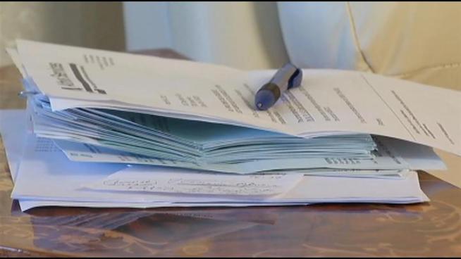Investigative Reporter Joel Grover asks new questions about why those who paid too much for track collection have not received refund checks.