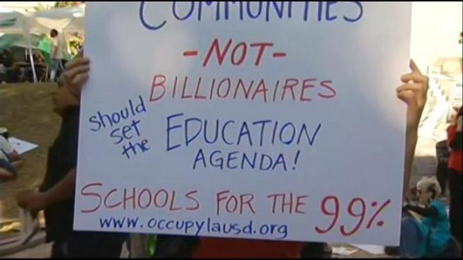 Teachers and parents calling themselves Occupy LAUSD march to the district's headquarters in Downtown LA.