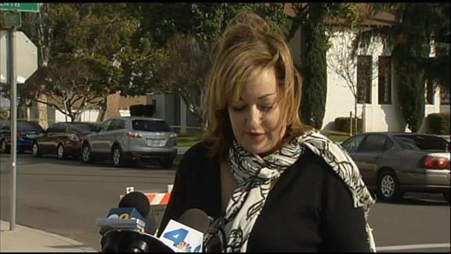 A bank robber dressed in body armor and carrying an assault rifle shot a police officer and dropped a lot of cash coming out of the bank.  Beverly White has details.