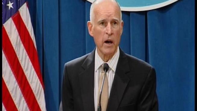 Governor Brown announced new budget cuts targeting education and social services.
