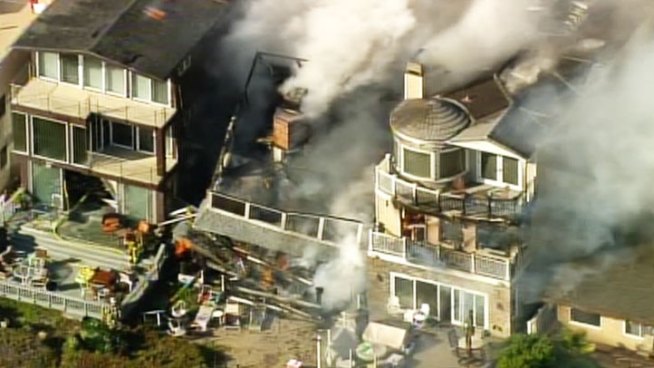Dramatic video of a beach-front home collapsing during a fire. The home was one of several that burned near the 16500 block of Pacific Coast Highway in Sunset Beach