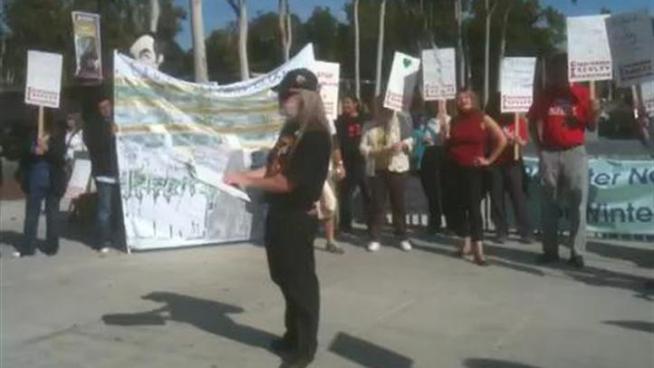 Faculty at California State University, Dominguez Hills march on campus Tuesday, giving information of the Nov. 17 California Faculty Association strike to be held on CSU Dominguez and East Bay campuses.