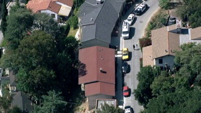 Police continued scouring the hills near University City Monday afternoon after a violent home invasion robbery. Antonio Castelan reports from the Hollywood Hills for the NBC4 News at 5 p.m. on July 2, 2012.