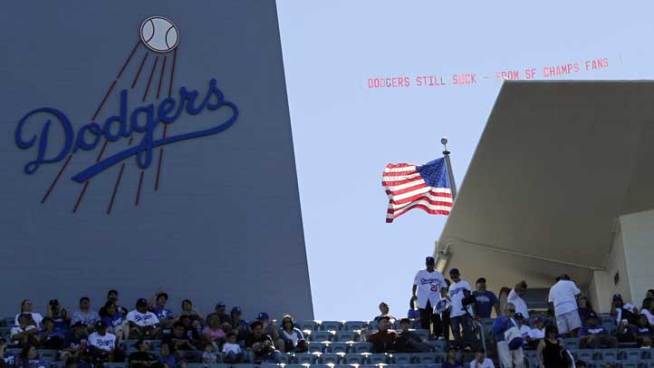 Thursday was opening day for Major League baseball, and the Dodgers had the task of welcoming last year's big winner. Local fans were not amused.