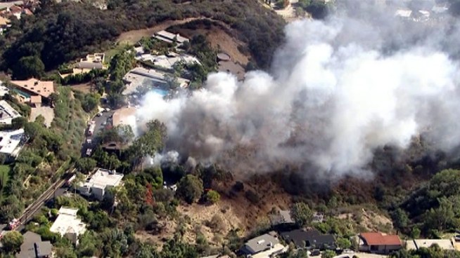 A fire broke out in a Brentwood home Monday afternoon amid dry, windy conditions that had firefighters worried the blaze could spread to neighboring homes. Patrick Healy reports from Brentwood for the NBC4 News at 5 p.m. on Nov. 12, 2012.