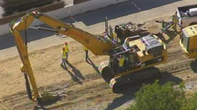 Workers talk about what it takes to pull off a massive project like the demolition of the Mulholland Bridge.