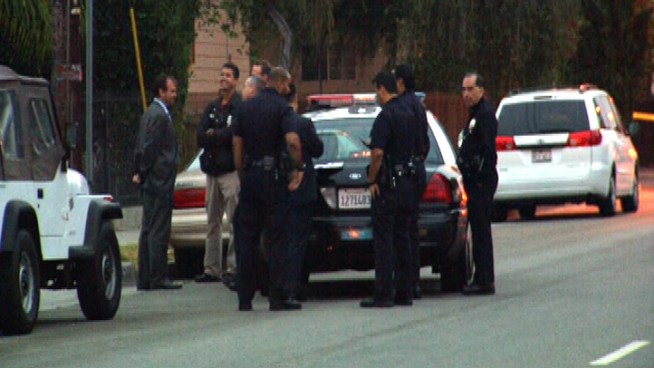 What responding officers thought might be a trash fire turns into an investigation.