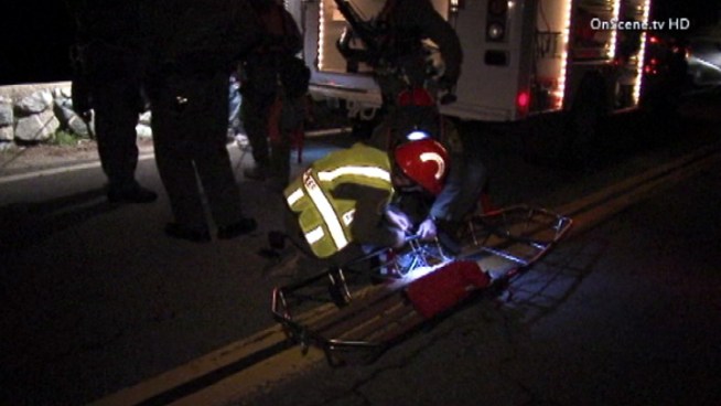 Rescuers hoisted the driver to safety after the crash late Wednesday in Angeles National Forest. Raw Video