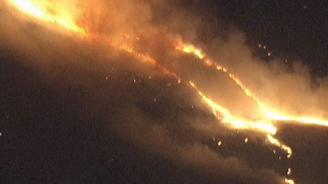 A blaze broke out at about 9 p.m. Tuesday night near a Palmdale residential development and quickly burned up hillsides. Within two hours, it was holding at 250 acres, but Los Angeles County Fire Department officials said wind would be a crucial factor in putting the blaze out completely. Alex Calder reports from NewsChopper4 and Janet Kwak from Palmdale for the NBC4 News at 11 p.m. on July 3, 2012.