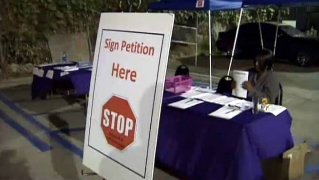 Churchgoers at Southern Missionary Baptist Church were met with a signature drive, not an offering plate, to kick-off a repeal of Senate Bill 48. Governor Jerry Brown signed the law requiring public school textbooks to include historical contributions of gay people.  But the message in this sanctuary was that the Governor went too far.