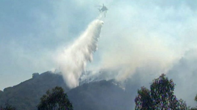As a blaze that grew to 30 acres in Rustic Canyon Saturday frightened homeowners in nearby Brentwood, firefighters mopped up a 90-acres fire in the Sepulveda Pass that has also scared nearby residents. No homes were burned in either blaze as of Saturday evening. Michelle Valles reports for the NBC4 News at 6 p.m. on Sept. 15, 2012.
