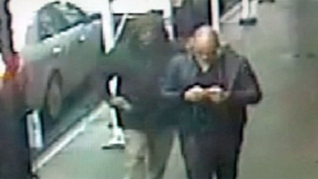 Brandon Woodard, 31, who lived in Playa Vista, was was shot in the head and killed on a busy Manhattan sidewalk Monday afternoon. His shooter remains at large. A photo taken from security camera video shows Woodard checking his phone as the gunman pulls a 9-mm semi-automatic handgun from his right pocket. He fired once, shooting Woodard in the head, and walks away, leaving him in a pool of blood. Angie Crouch reports from Ladera Heights for the NBC4 News at 5 p.m. on Dec. 11, 2012.