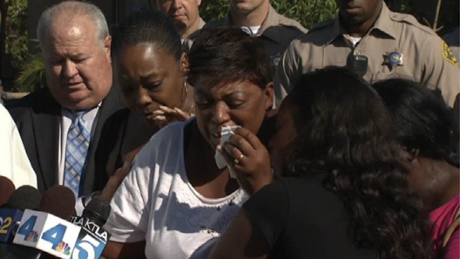 The family of 14-year-old Unique Russell, killed during a Fourth of July block party, issue an emotional plea for information in the shooting. The victim's stepmother says Russell was a casualty in a war 