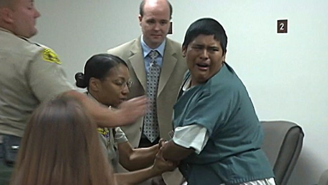Fernando Salgado broke down and had to be restrained after he was ordered to stay in jail until a July 9 bail hearing in connection with a hazing incident at AB Miller High School. The 18-year-old pleaded not guilty to charges including assault and child cruelty. Craig Fiegener reports from San Bernardino for the NBC4 News at 5 p.m. on June 28, 2012.