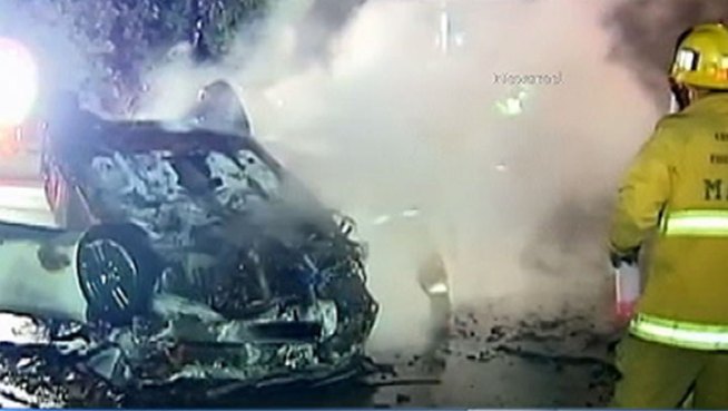 Raw video from the scene where two Good Samaritans saved a man's life after a fiery crash.