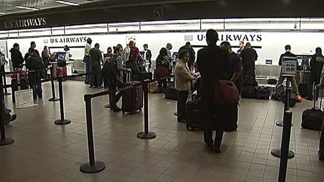 Nearly 200 flights at Los Angeles International Airport were canceled, due to superstorm Sandy on the East Coast. Toni Guinyard reports for the NBC4 News at Noon on Oct. 30, 2012.