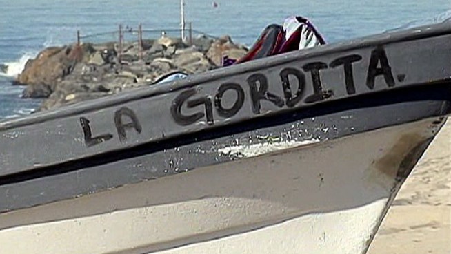Police questioned 15 men, four women and a juvenile who were believed to have illegally crossed the U.S.-Mexican border from Tijuana in this boat on Tuesday, March 20, 2012. NBC4's Annette Arreola interviews Lt. Raymond Garcia, the spokesman for El Segundo officers who first responded to the beach where the group was spotted.