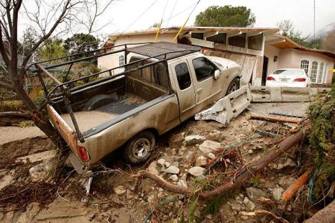 Race Is on to Clear Debris Basins Before More Rain