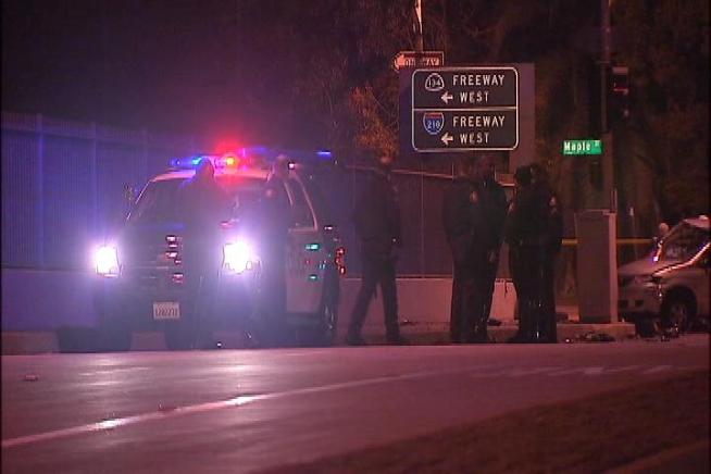Candles burned and flowers filled the area Wednesday night near where two people, including a child, were killed in a Christmas night traffic collision that injured three others. Jane Yamamoto reports for the NBC4 News at 11 p.m. on Dec. 26, 2012.
