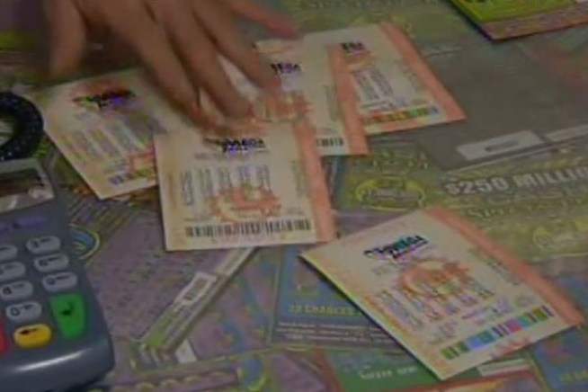 NBC4's Angie Crouch captures the mood among people feeling Mega Millions Lottery mania on Friday, March 30, 2012.