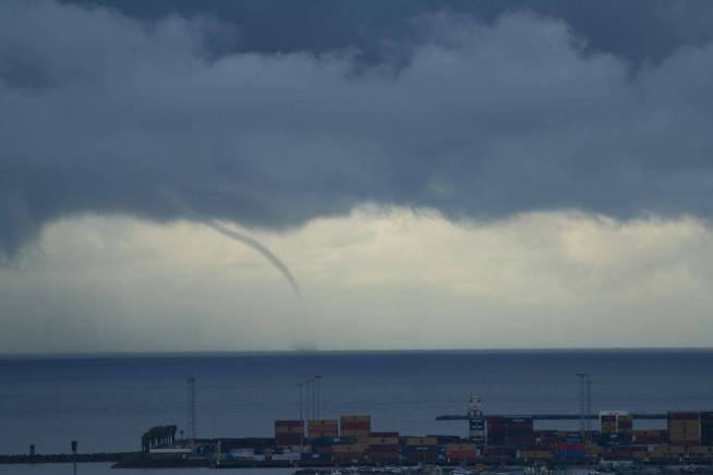 Waterspouts, Flooded Homes in Long Beach