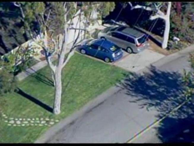 Watch aerial video from a neighborhood where an attorney was found shot.