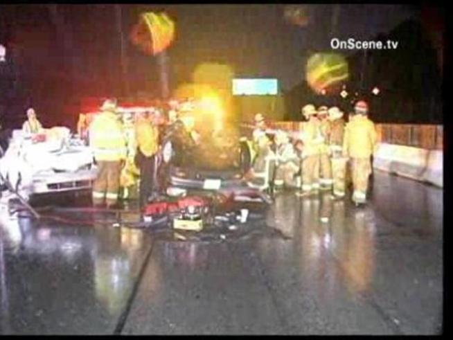 Five people died in a collision amid a downpour on the I-5 Freeway in the Newhall Pass early Monday.