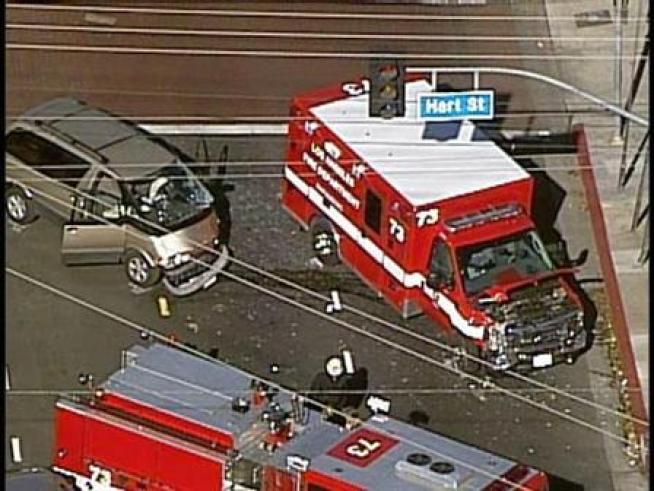 A minivan and LAFD ambulance are involved in a crash in Reseda.