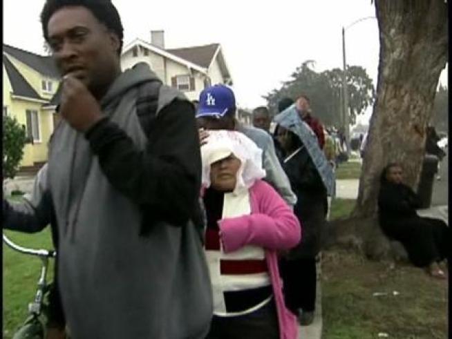 An annual turkey giveaway draws a crowd that winds around the block.