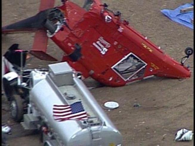 Watch raw aerial video from the site of a helicopter accident.