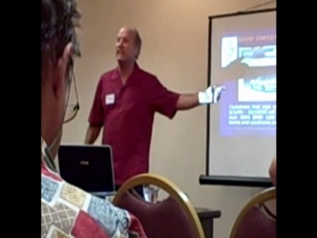 Mike Lammons, an international director for Ijango, recruits potential members at a San Jose event. The Better Business Bureau has issued warnings about Ijango's practices.