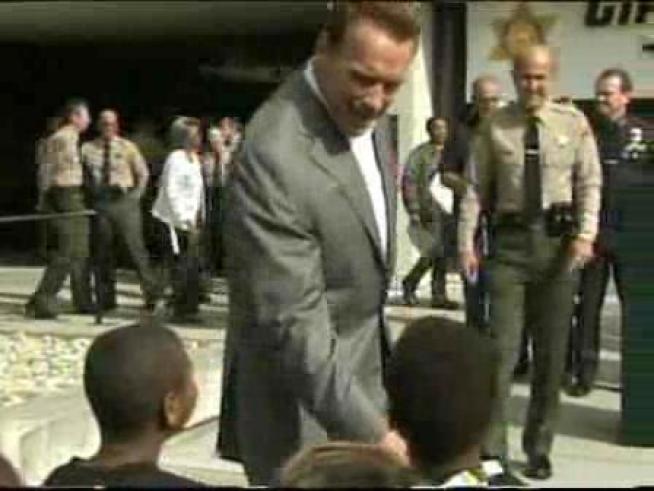 Gov. Arnold Schwarzenegger arrives in LA to kick-off the Guns for Gifts program.