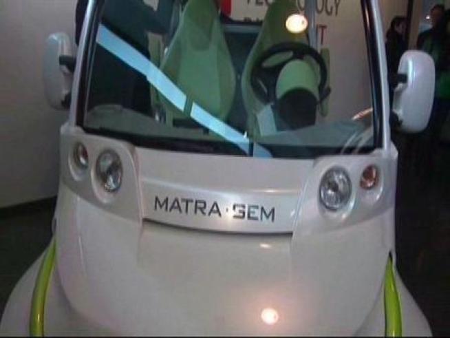 If you drive one of these Matra Light Electric Vehicles, you'd be paying only 2 cents per mile.  And you can take a bike with you!