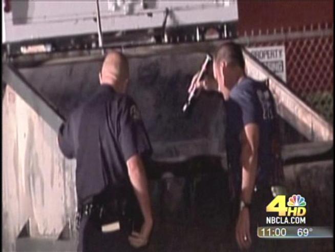 Bound Body Found in Burning Trash Bin
