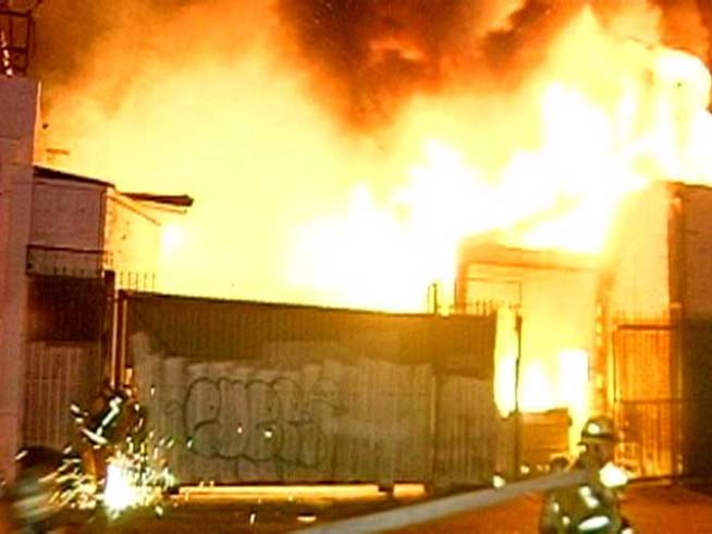 Three firefighters are injured as crews battle the blaze for about two hours. 