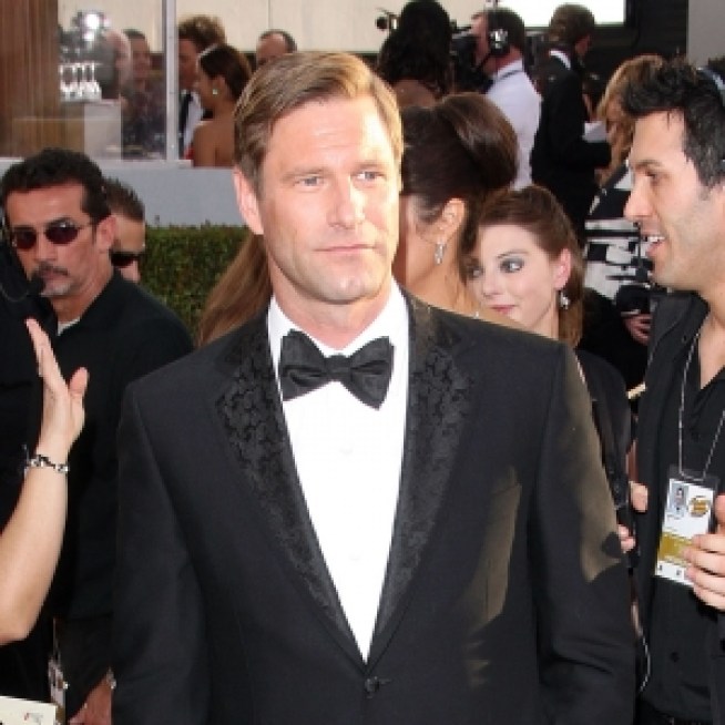 Aaron Eckhart On Heath Ledger’s Absence From Globes: ‘I Wish He Was Here’