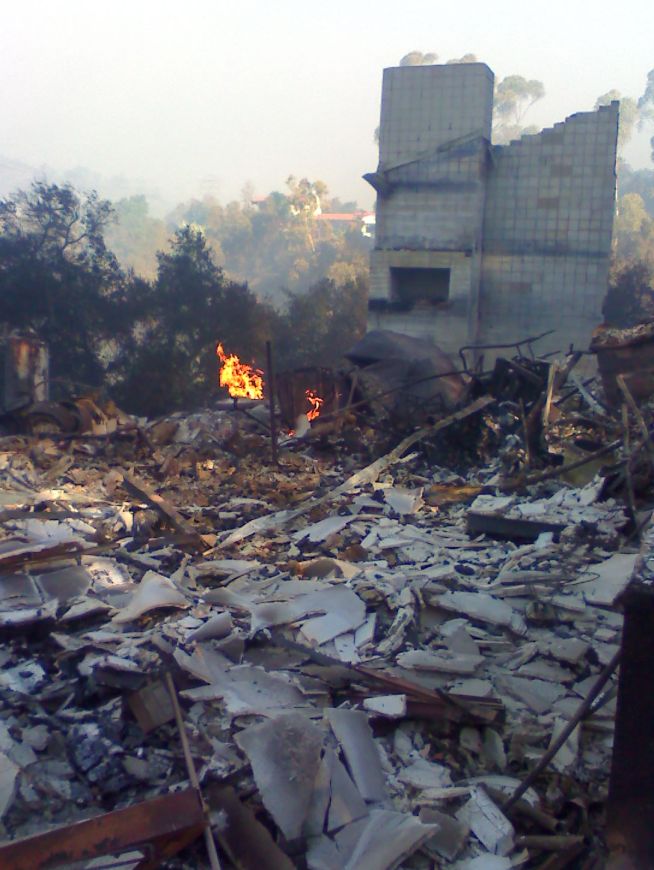 Victims of Tea Fire See Damage for First Time