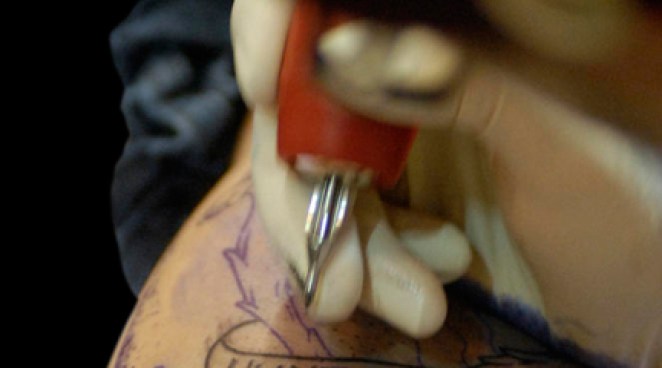 Man Steals "God" Tattoo 