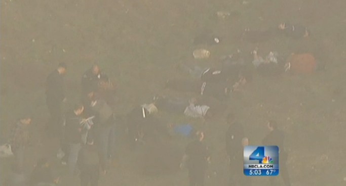 More than two dozen people were detained in a human smuggling bust off the coast Monday. Federal agents made the discovery in a routine patrol Monday morning near Portuguese Bend Beach in Rancho Palos Verdes. Resident Tom Redfield said one member of the group ran into his backyard and asked for help. Angie Crouch reports from Rancho Palos Verdes for the NBC4 News at 5 p.m. on Dec. 10, 2012.