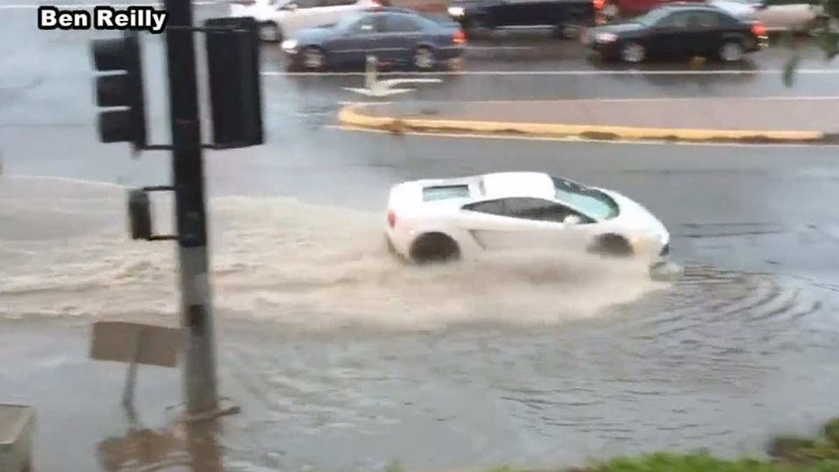 Goes for Dip in Flooded Intersection NBC Los Angeles