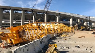 crane collapses at construction site